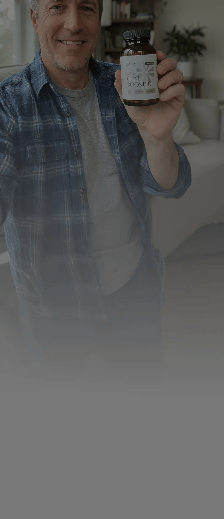 Man holding a Bioma GLP-1 Booster bottle