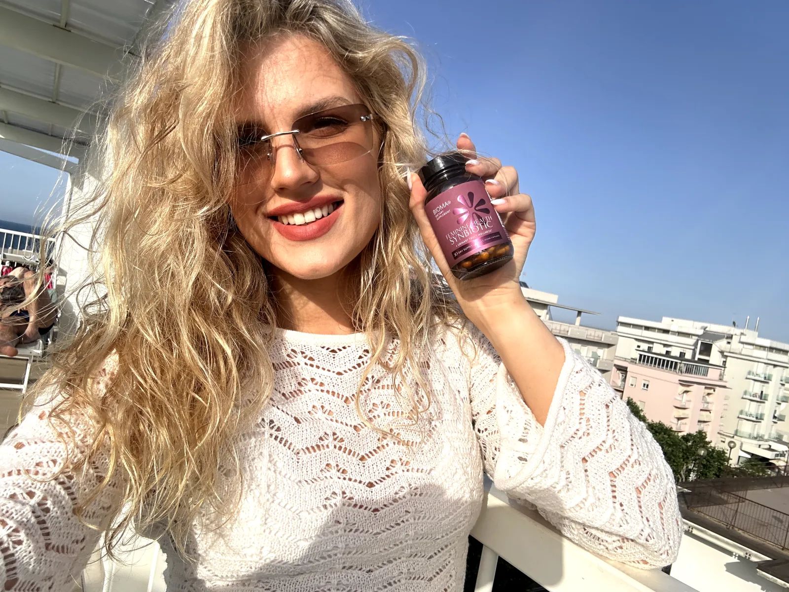 Bioma Feminine Health customer holding a bottle