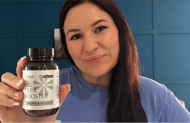 Bioma GLP-1 Booster customer holding a bottle